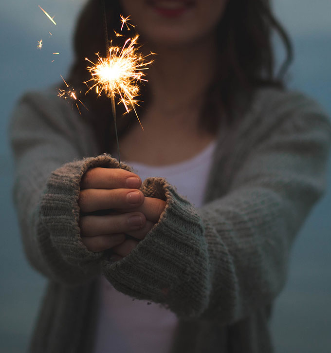 Woman holding a sparkler