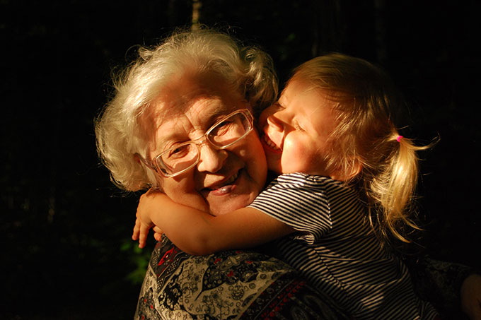 Grandma and child hugging